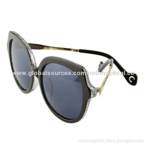 Oversize black tortoise sunglasses temple with hole deco